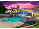 Relaxing pool and patio area with lounge chairs at 2042 E Victor Rd Rd, Gilbert, AZ 85296