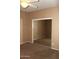 Neutral bedroom with a ceiling fan and a mirrored sliding closet door at 2335 W Muirfield Dr, Anthem, AZ 85086