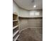 Walk-in closet features carpet and shelving at 2335 W Muirfield Dr, Anthem, AZ 85086
