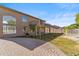 Brick-paved pathway leads to a large backyard with a pool at 2380 W Megan St, Chandler, AZ 85224