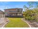 Two-story home with a large backyard, grassy area, and pool at 2380 W Megan St, Chandler, AZ 85224