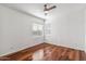 Light and airy bedroom with hardwood floors and window coverings at 2380 W Megan St, Chandler, AZ 85224