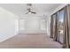 Bright bedroom with ceiling fan and large window at 2380 W Megan St, Chandler, AZ 85224