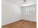 Simple bedroom with hardwood floors and plantation shutters at 2380 W Megan St, Chandler, AZ 85224