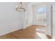 Bright dining room with hardwood floors and chandelier at 2380 W Megan St, Chandler, AZ 85224