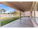 Covered patio overlooks a large backyard with a sparkling pool at 2380 W Megan St, Chandler, AZ 85224