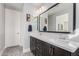 The primary bathroom features a double vanity and modern fixtures at 25311 N 19Th Ln, Phoenix, AZ 85085