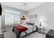 Bright bedroom with ceiling fan, bedside tables, and southwest style decor at 25311 N 19Th Ln, Phoenix, AZ 85085