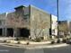 Modern townhome complex showcasing clean lines, desert landscaping, and paved street at 25311 N 19Th Ln, Phoenix, AZ 85085