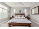 This is the main bedroom with neutral decor and a large window at 25311 N 19Th Ln, Phoenix, AZ 85085