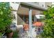 This comfortable patio is an outdoor living space with modern furniture and decor at 25311 N 19Th Ln, Phoenix, AZ 85085