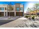 Contemporary townhome featuring a garage and drought tolerant landscaping at 25311 N 19Th Ln, Phoenix, AZ 85085