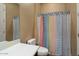 Simple guest bathroom with shower/tub combo at 27062 W Behrend Dr, Buckeye, AZ 85396