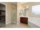 Bathroom features a walk-in shower and a relaxing bathtub at 27062 W Behrend Dr, Buckeye, AZ 85396