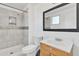 Clean bathroom with a shower/tub combo and updated vanity at 3144 N 81St Dr, Phoenix, AZ 85033