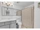 Clean bathroom with a shower/tub combo and vanity at 3144 N 81St Dr, Phoenix, AZ 85033