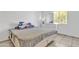 Bright bedroom with plush carpeting and a large closet at 3144 N 81St Dr, Phoenix, AZ 85033