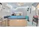 Bedroom with a large bed and a ceiling fan at 3144 N 81St Dr, Phoenix, AZ 85033