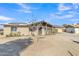 Ranch style home with carport, mature trees, and a spacious yard at 3144 N 81St Dr, Phoenix, AZ 85033