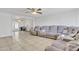 Open living area with tile floors and views into adjacent rooms at 3144 N 81St Dr, Phoenix, AZ 85033
