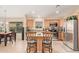 Well-equipped kitchen with stainless steel appliances and island at 37110 W Leonessa Ave, Maricopa, AZ 85138