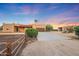 House with a long driveway and wooden fence at 37213 N 17Th Ave, Phoenix, AZ 85086