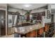 Modern kitchen with dark wood cabinets and granite counters at 37213 N 17Th Ave, Phoenix, AZ 85086