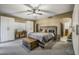 Bright main bedroom with ample closet space and plush bedding at 37213 N 17Th Ave, Phoenix, AZ 85086