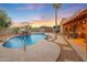 Private backyard with a refreshing pool and a covered patio area at 37213 N 17Th Ave, Phoenix, AZ 85086