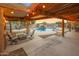 Inviting backyard oasis featuring a sparkling pool and relaxing patio at 37213 N 17Th Ave, Phoenix, AZ 85086