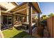 Covered patio with hot tub and artificial turf at 3841 E Patrick St, Gilbert, AZ 85295