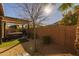 Landscaped backyard with hot tub and covered patio at 3841 E Patrick St, Gilbert, AZ 85295
