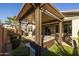 Covered patio with hot tub and artificial turf at 3841 E Patrick St, Gilbert, AZ 85295