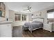 Bright bedroom with wood flooring and a cozy bed at 3841 E Patrick St, Gilbert, AZ 85295