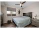 Guest bedroom with wood flooring and ceiling fan at 3841 E Patrick St, Gilbert, AZ 85295