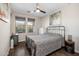Guest bedroom with metal bed frame and wood flooring at 3841 E Patrick St, Gilbert, AZ 85295