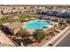 Community pool with surrounding lounge chairs at 3841 E Patrick St, Gilbert, AZ 85295