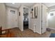 Bright entryway with wood-look tile flooring and a bench at 3841 E Patrick St, Gilbert, AZ 85295