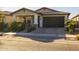 Single-story home with a two-car garage and landscaped front yard at 3841 E Patrick St, Gilbert, AZ 85295