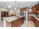 Open concept kitchen with an island and stainless steel appliances at 3841 E Patrick St, Gilbert, AZ 85295