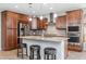 Modern kitchen with stainless steel appliances and granite countertops at 3841 E Patrick St, Gilbert, AZ 85295