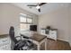 Home office with a large desk and built in storage at 3841 E Patrick St, Gilbert, AZ 85295