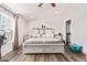 Spacious bedroom with a king-size bed and built-in shelving at 43459 N Terrace View Ave, San Tan Valley, AZ 85140