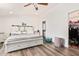 Bright bedroom with a king-size bed, walk-in closet, and ensuite bathroom at 43459 N Terrace View Ave, San Tan Valley, AZ 85140