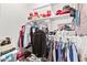 Large walk-in closet with ample shelving and hanging space at 43459 N Terrace View Ave, San Tan Valley, AZ 85140