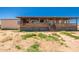 House exterior with large covered patio at 43459 N Terrace View Ave, San Tan Valley, AZ 85140