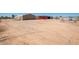 Large, open yard with a metal building and food truck at 43459 N Terrace View Ave, San Tan Valley, AZ 85140