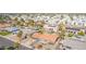 Aerial view showcases homes with solar panels, lush landscapes and community features at 502 E Le Marche Ave, Phoenix, AZ 85022