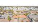 Stunning aerial view of homes, palm trees and community amenities under a sunny sky at 502 E Le Marche Ave, Phoenix, AZ 85022