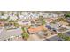 Aerial view of neighborhood featuring single-Gathering homes with pools, desert landscaping, and tile roofs at 502 E Le Marche Ave, Phoenix, AZ 85022